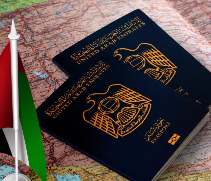 UAE passports and flag on a world map