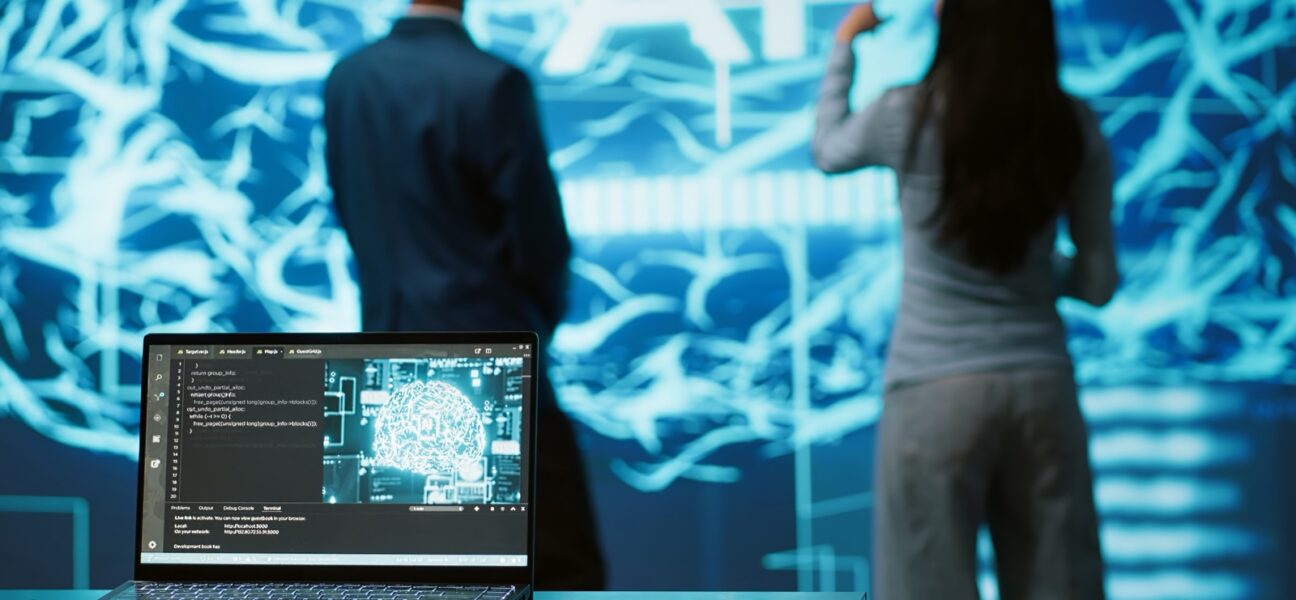 IT professionals viewing an artificial intelligence display in an enterprise setting