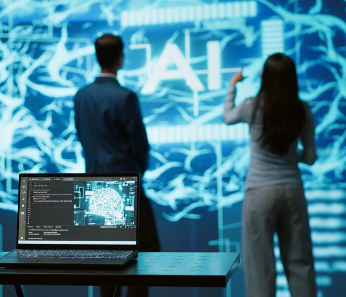 IT professionals viewing an artificial intelligence display in an enterprise setting